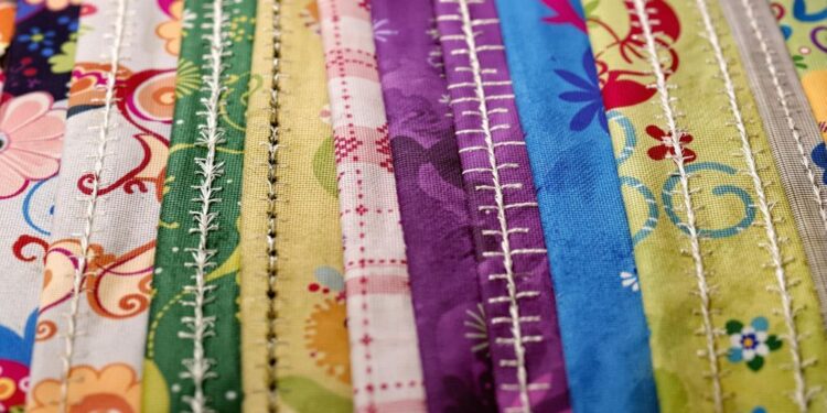 Close-up of different sewing machine stitch types.